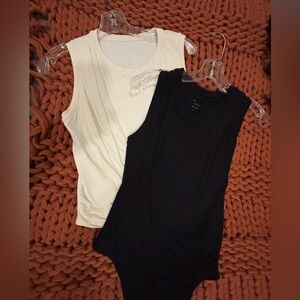 2 sleeveless tops
